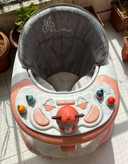 Encourage your baby's first steps with the R FOR RABBIT Baby Walker, offering stability, comfort, and interactive play for your little one's development. Adjustable height settings ensure a perfect fit as your baby grows.