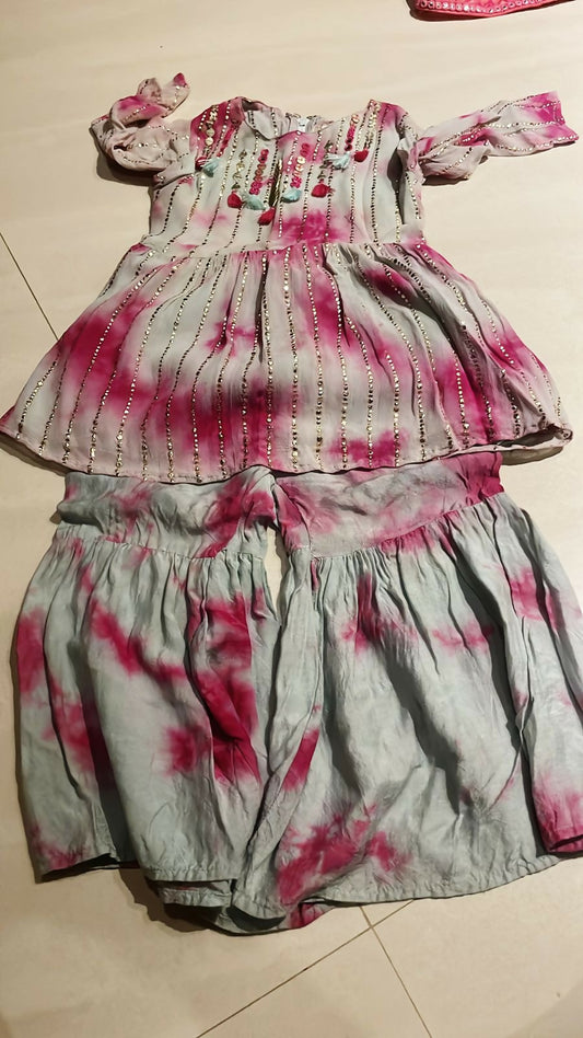 Elevate your baby girl's style with our Kurta and Sharara Set, crafted for traditional charm and comfort.