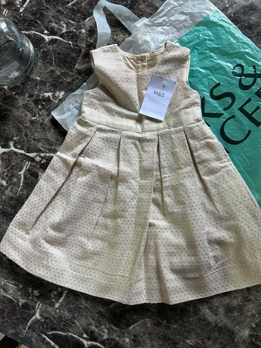 Discover the stylish and comfortable MARKS AND SPENCER Dress/Frock for baby girls, perfect for any occasion with its high-quality fabric and elegant design.