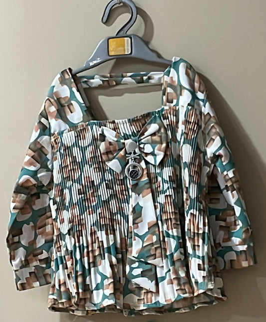 Elevate your baby girl's style with our charming collection of tops—crafted for comfort and designed to enchant!