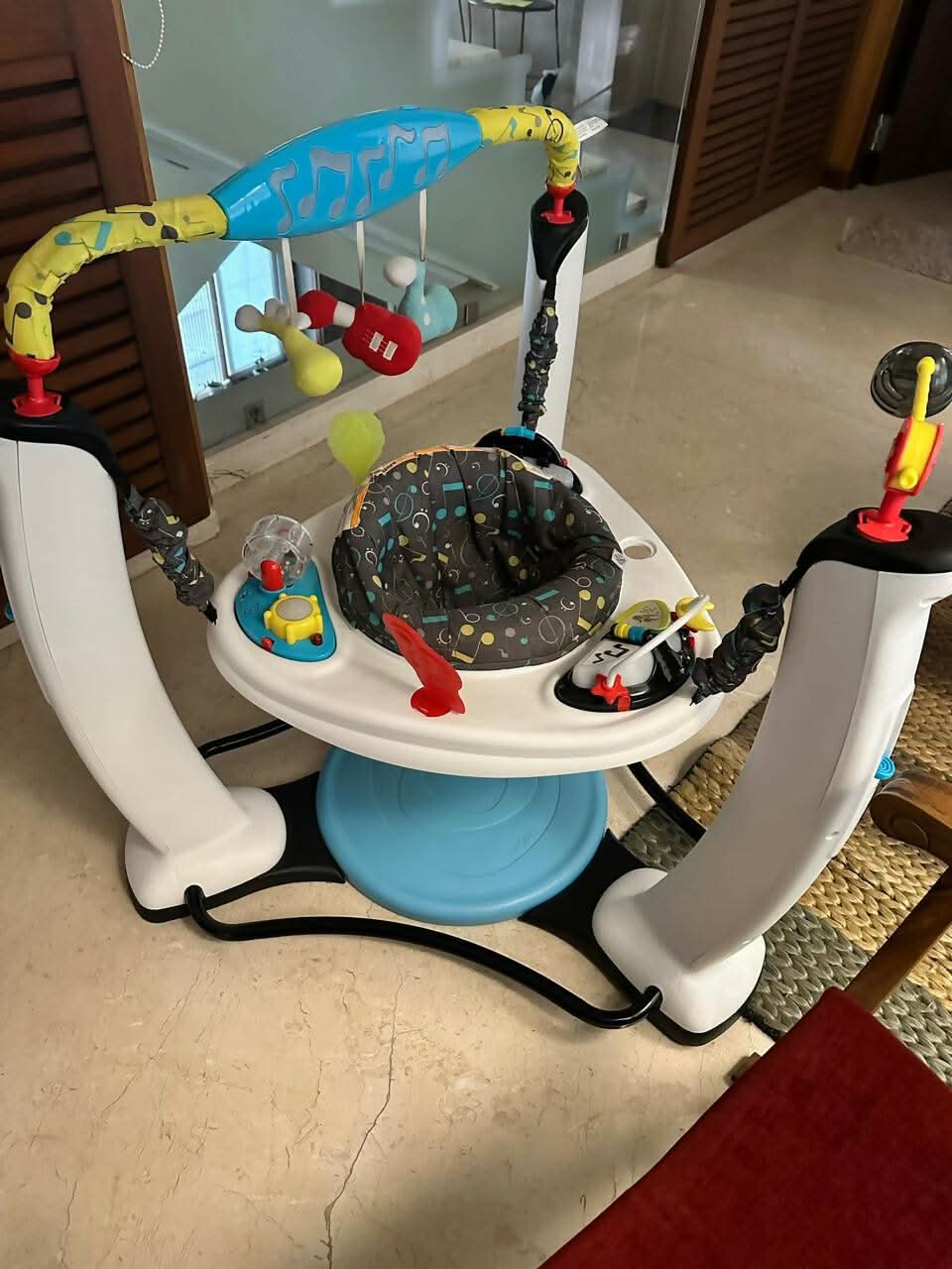 EVENFLO ExerSaucer Jam Session Jumping Activity Center