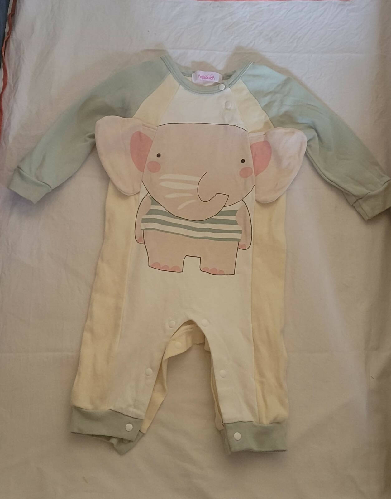 Make a statement with the HOPSCOTCH Animal Print Full-Sleeve Bodysuit - where comfort and style come together for your little one's everyday adventures!