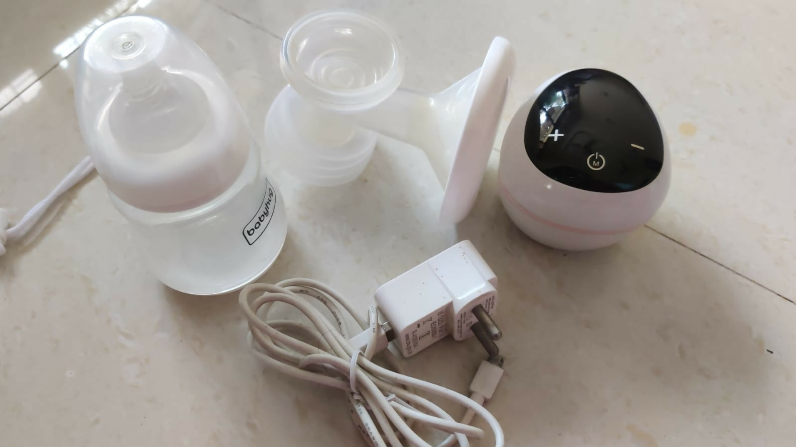 Enjoy convenient and discreet pumping with the BABYHUG Portable Electric Breast Pump, offering adjustable suction levels and a compact design for on-the-go use.