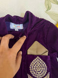 Elegant purple baby sherwani with intricate detailing, soft fabric, and comfortable fit, perfect for festive occasions and celebrations.