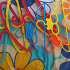 Add a splash of fun and organization to your child's closet with these colorful small hangers, specially designed to hold baby and toddler outfits perfectly. 