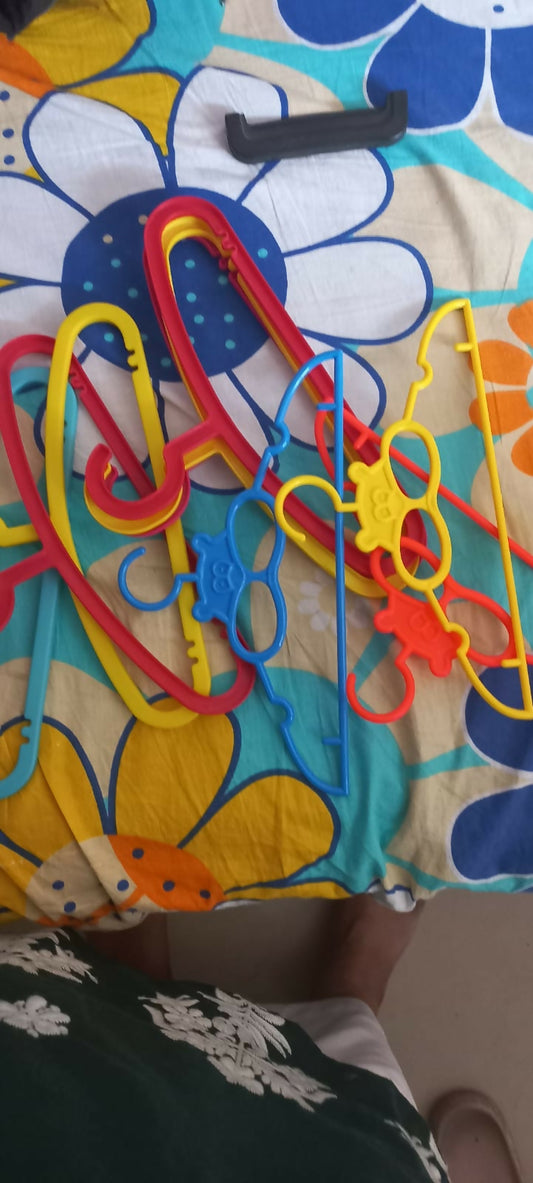 Add a splash of fun and organization to your child's closet with these colorful small hangers, specially designed to hold baby and toddler outfits perfectly. 