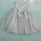 Peach sleeveless dress for baby girls by Babyhug, perfect for summer outings, casual events, and photoshoots.