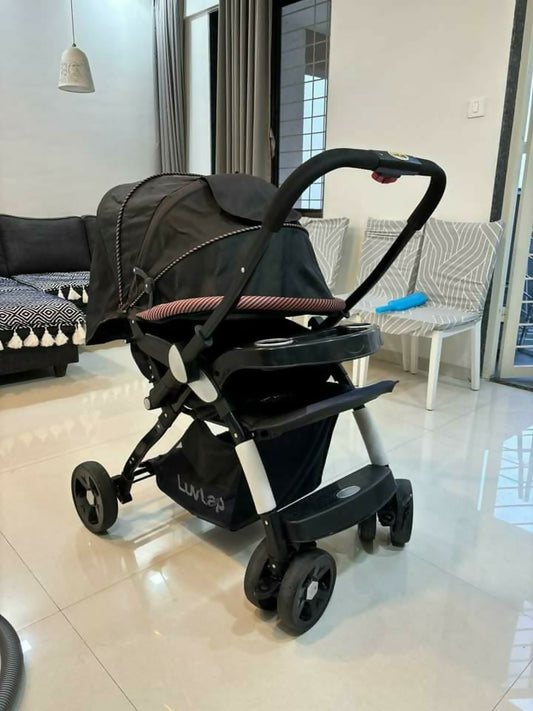 Experience comfort and convenience with the LUVLAP Galaxy Stroller/Pram, designed for safety and style in every outing with your baby.