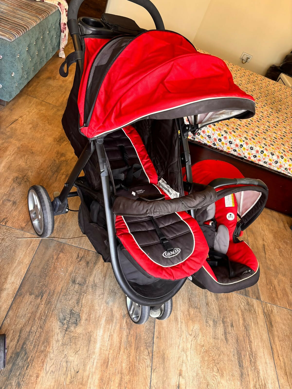 GRACO Air Click 3 Travel System with baby stroller and infant car seat, featuring a convenient click-connect design, reclining stroller seat, protective canopy, safety harness, and comfortable infant seating for everyday travel.