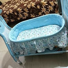Provide your baby with a cozy, safe, and stylish sleeping space with the Mandot Impex 1st Step Cradle, complete with a swing, mosquito net, and storage basket!