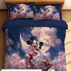 Mickey and Minnie Mouse bedding set on a bed with a moon and cloud design.