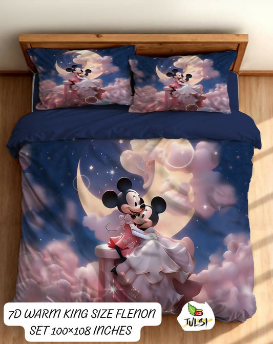 Mickey and Minnie Mouse bedding set on a bed with a moon and cloud design.