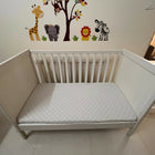 IKEA Sundvik white baby cot with mattress, fitted sheets and cot bumpers, almost new condition, convertible toddler bed design