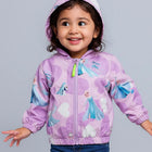 Child wearing a purple jacket with character prints 
