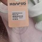 Kanfab baby care tag on a garment with visible text and barcode.