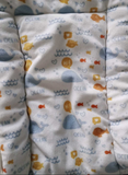 Baby blanket with animal patterns on a white background