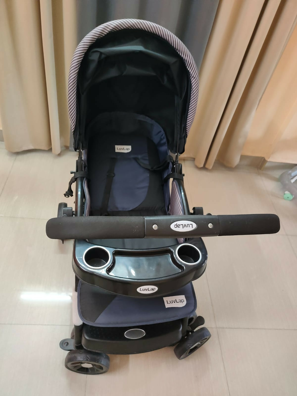 Buy LuvLap Baby Stroller – Safe, foldable pram with reclining seat, safety harness, and storage basket for newborns and toddlers.
