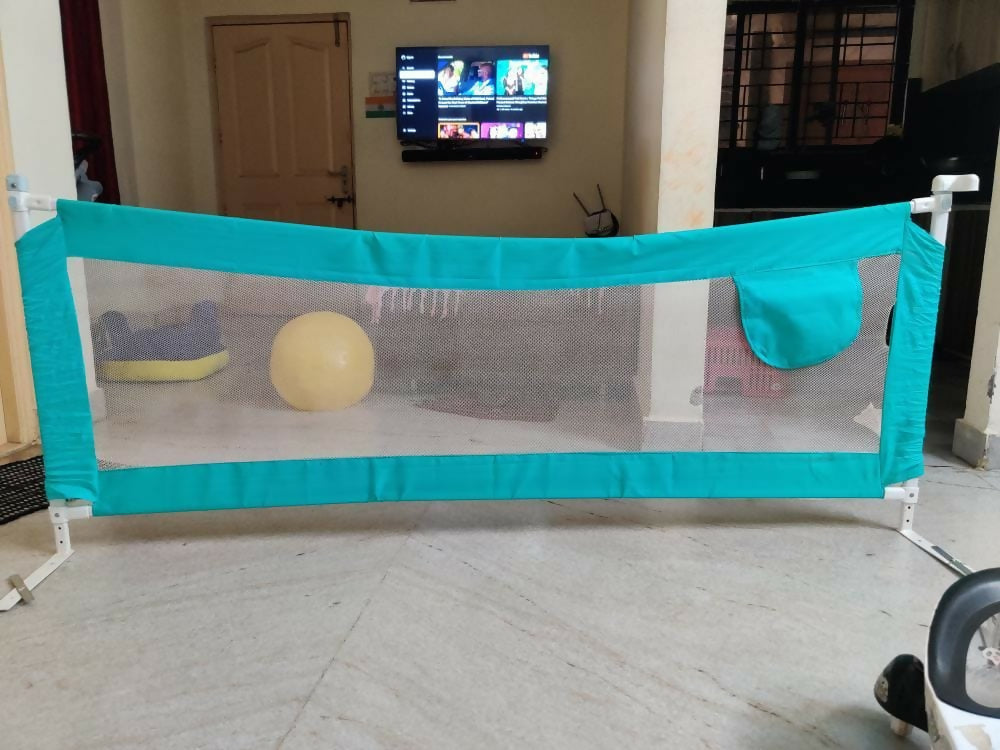 Keep your baby safe during sleep with the LUVLAP Bed Rail for Baby – featuring a secure frame, breathable mesh sides, and easy installation for peace of mind and convenience.