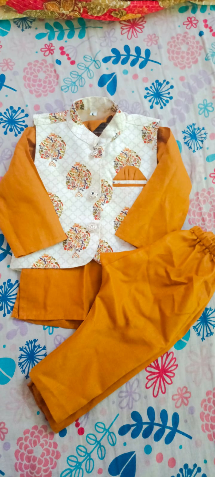  Dress your little one in style with the Kurta Pyjama and Printed Fancy White Base Jacket—perfect for festive occasions, blending tradition with a chic, modern touch!