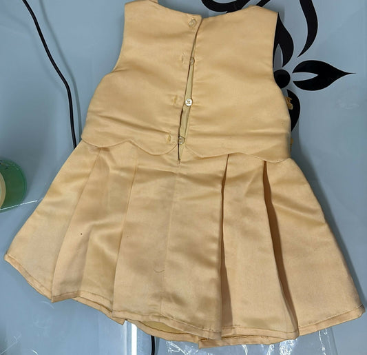 Beige fabric piece with a zipper on a light blue background