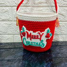 Red woven basket with 'Merry Christmas'