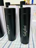Two black thermos bottles with 'Taksfevi' branding 