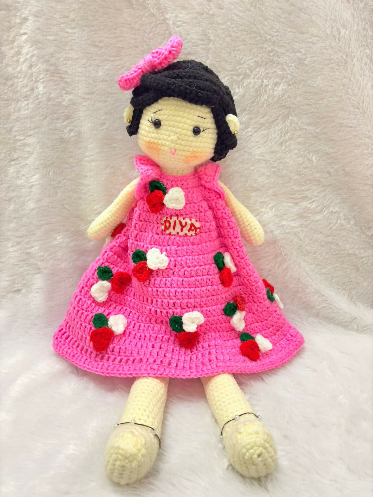 Personalised baby doll with soft hair and custom name embroidery – perfect gift for infants and toddlers.