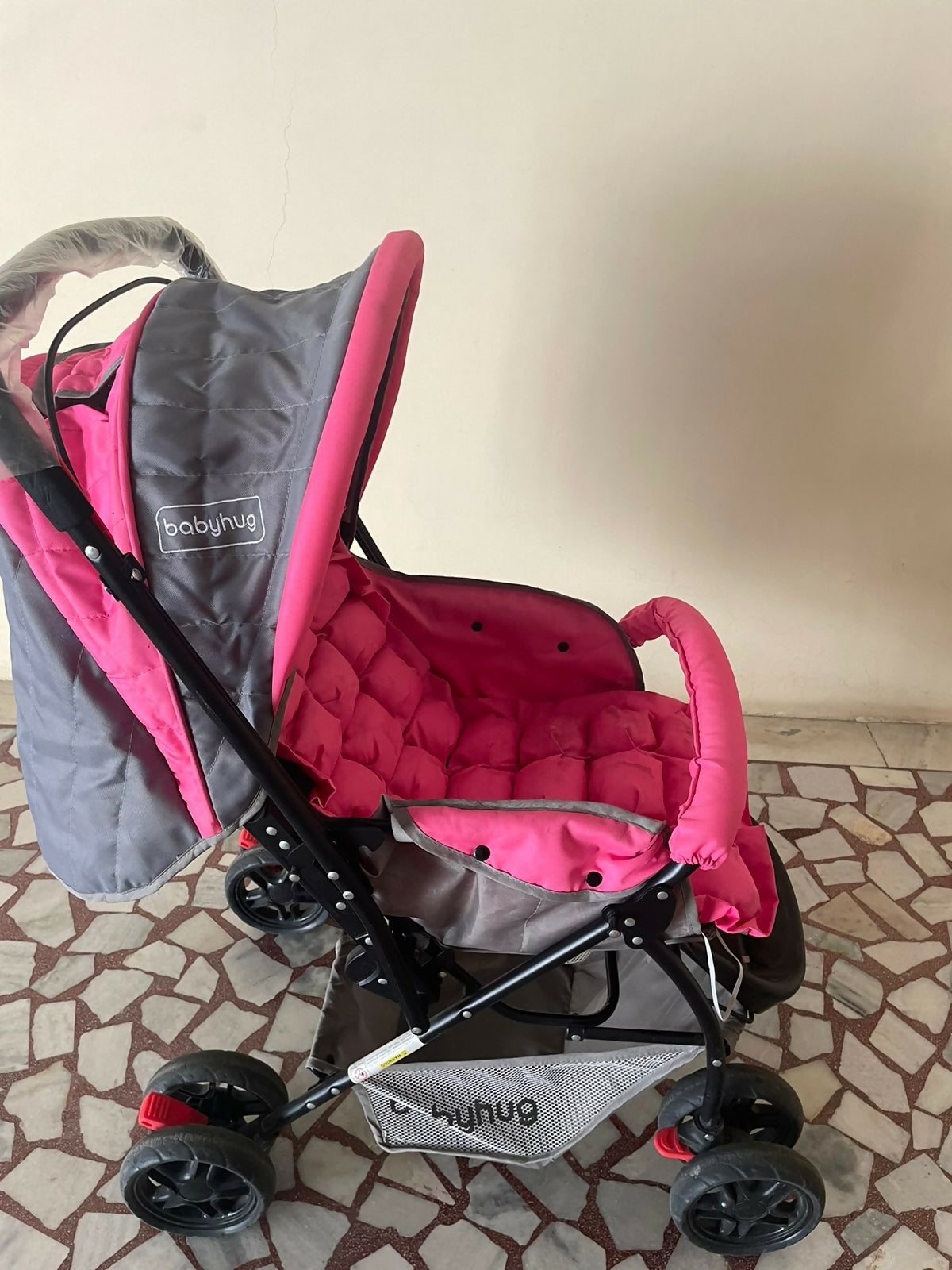 Experience comfort and convenience with the BABYHUG Stroller/Pram for Baby, featuring a spacious seat, adjustable canopy, and one-hand folding mechanism for easy travel and storage.