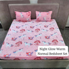 Pink unicorn-patterned bedsheet set on a bed with pillows.