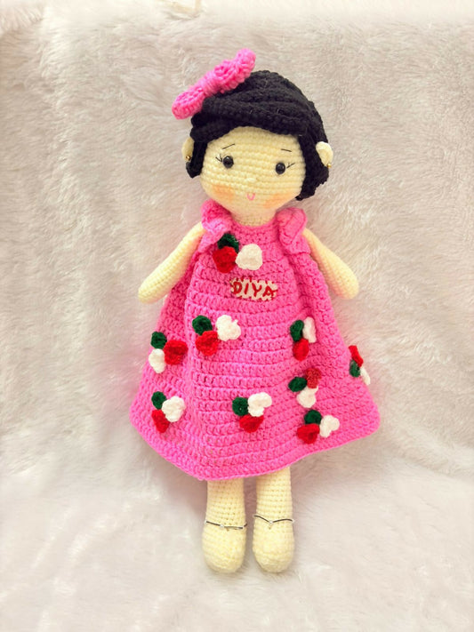 Personalised baby doll with soft hair and custom name embroidery – perfect gift for infants and toddlers.