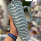 SITARAYURI Premium Insulated Tumbler (900 ml) with double-wall stainless steel insulation, spill-resistant lid, reusable straw, ergonomic handle, and large capacity to keep beverages hot or cold for hours.