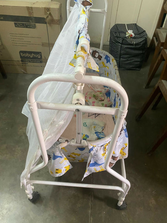 Babyhug manual cradle – smooth, secure, and breathable swing cradle for peaceful newborn sleep.

