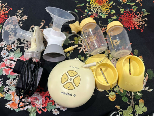 MEDELA Swing Maxi double electric breast pump – fast, efficient, and portable solution for mothers.
