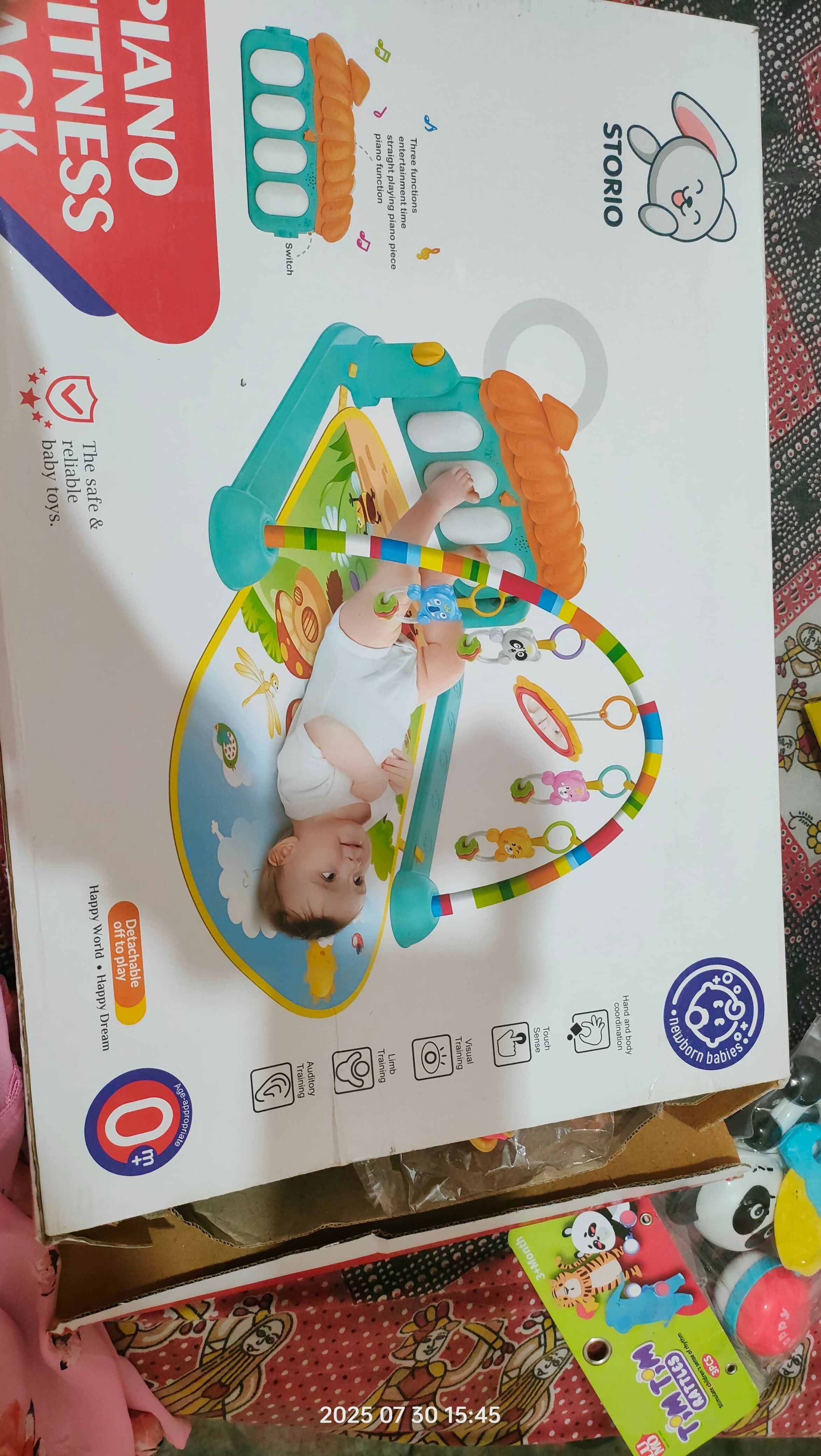 Baby playpen with colorful toys 