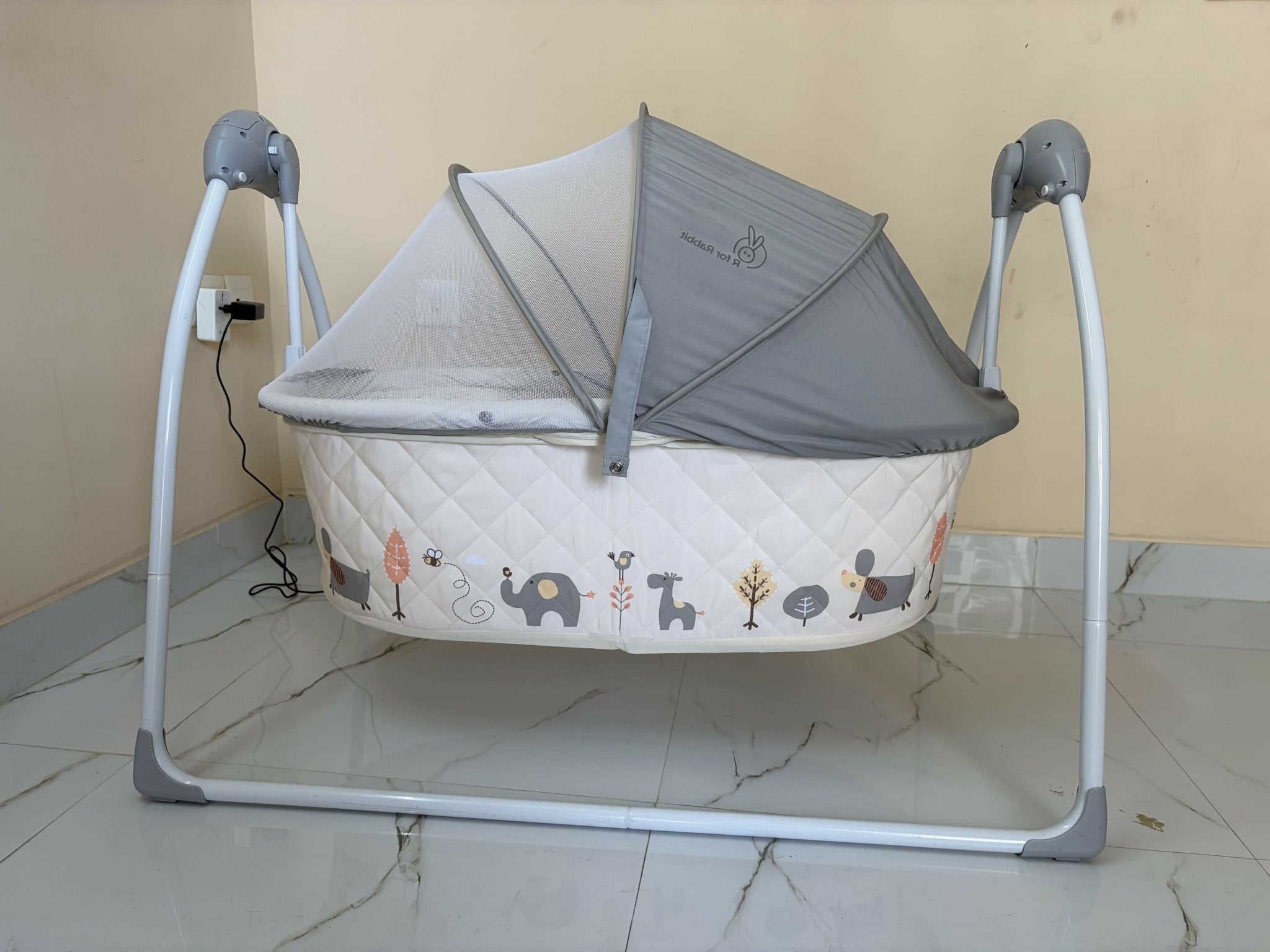 R for Rabbit Lullabies baby automatic electric cradle with gentle rocking motion, cozy sleeping space, secure design, soothing comfort, and automatic swing support for baby sleep.