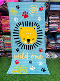 Children's towel with a lion design and 'wild one' text 