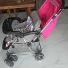 BABYHUG 2 in 1 Rock and Roll stroller cum rocker with reclining seat, sturdy wheels, safety harness, canopy, and dual stroller-to-rocker design for baby comfort and travel.