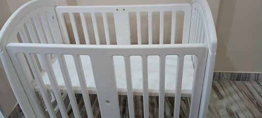 BABYHUG Compacto 3-in-1 Cot Cum Rocker Cum Study Table featuring a versatile convertible design that transforms from a baby cot and rocker into a practical study table for extended use.