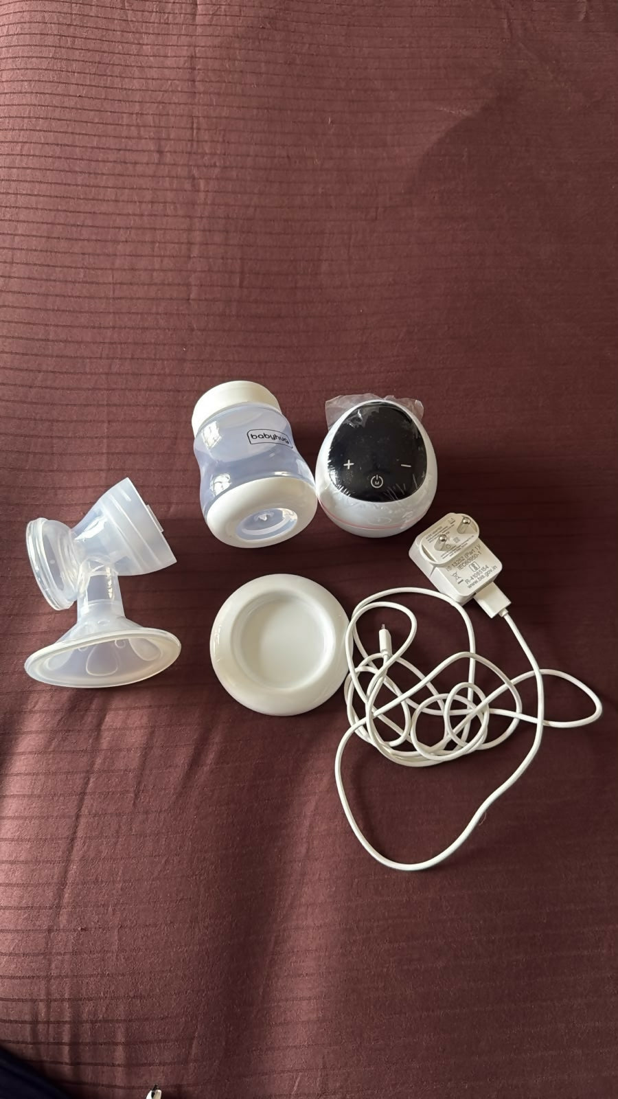 BABYHUG Electric Breast Pump with adjustable suction levels, soft silicone massage cushion, quiet operation, rechargeable design, and BPA-free components for comfortable and efficient milk expression.