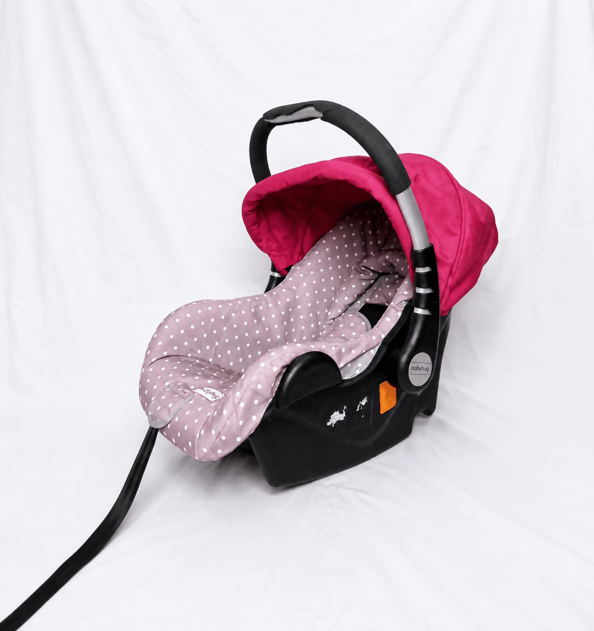 BABYHUG infant car seat carry cot with baby carrier function, rear-facing design, cushioned seat, secure safety harness, and carry handle for newborns and infants up to 13 kg.