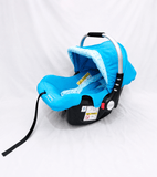 BABYHUG infant car seat carry cot with canopy, rear-facing design, cushioned seating, 5-point safety harness, ergonomic carry handle, and sun-protective canopy for newborns and infants up to 13 kg.