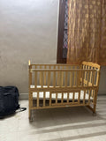 BABYHUG Montana cradle crib with sturdy construction, cozy sleeping space, secure side rails, and comfortable support for newborns, infants, and growing babies.