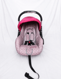 BABYHUG infant car seat carry cot with baby carrier function, rear-facing design, cushioned seat, secure safety harness, and carry handle for newborns and infants up to 13 kg.