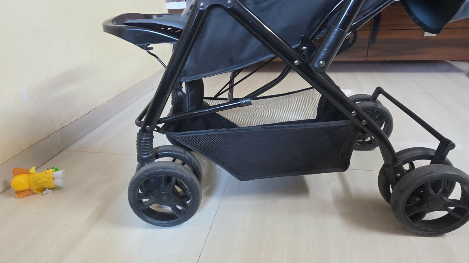 BABYHUG Symphony stroller with reversible handle, reclining seat, safety harness, adjustable canopy, smooth wheels, and comfortable travel support for babies and toddlers.
