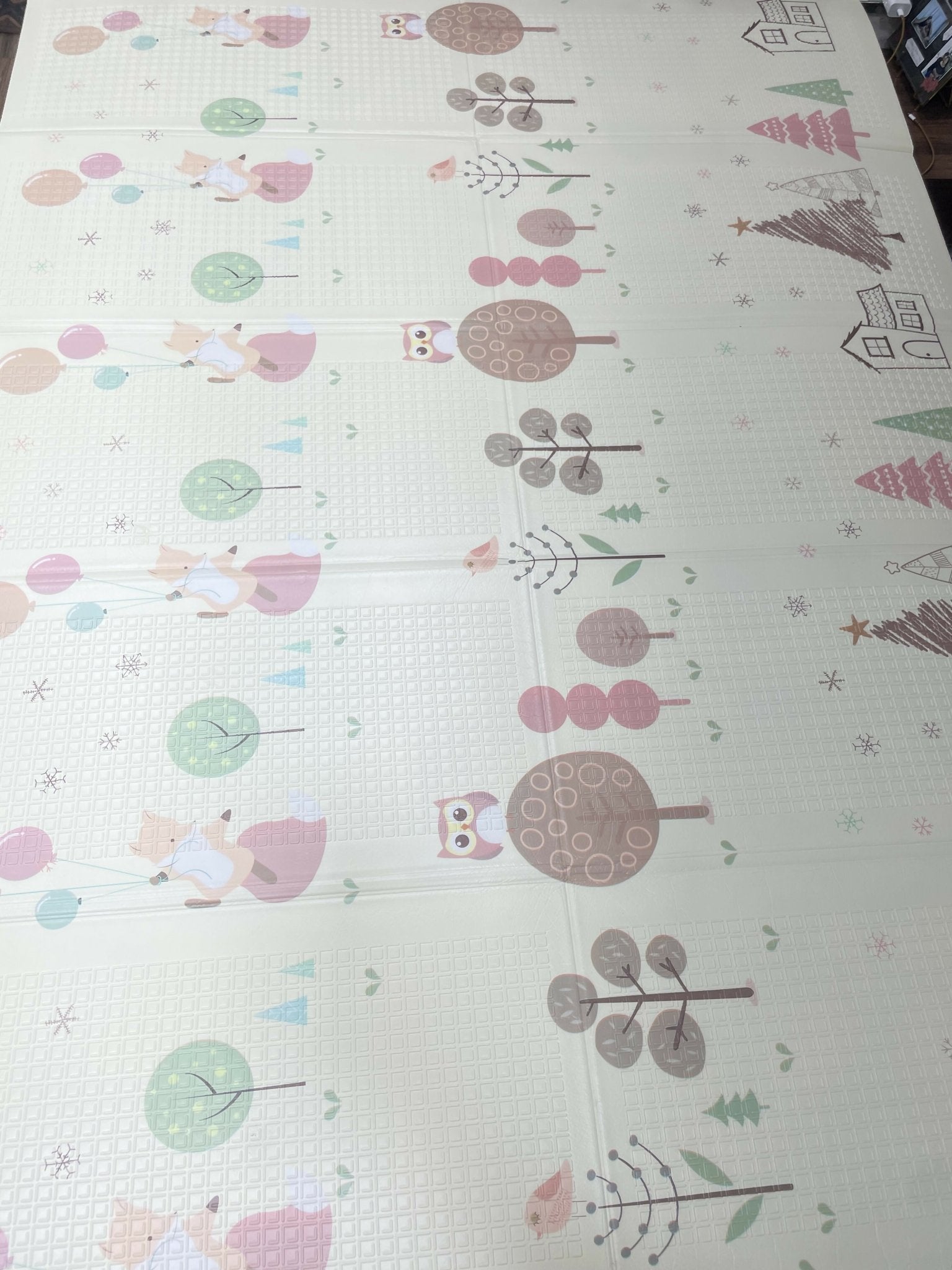 Baby playmat with a soft cushioned surface, comfortable padding, and spacious design for tummy time, crawling, playtime, and early learning activities.