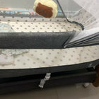 R FOR RABBIT Lullabies Woodsy Electric Cradle with Automatic Swing in Grey, Almost New condition, featuring automatic swinging functionality, a sturdy wooden frame, comfortable sleeping space, and a soothing design for newborns and infants.