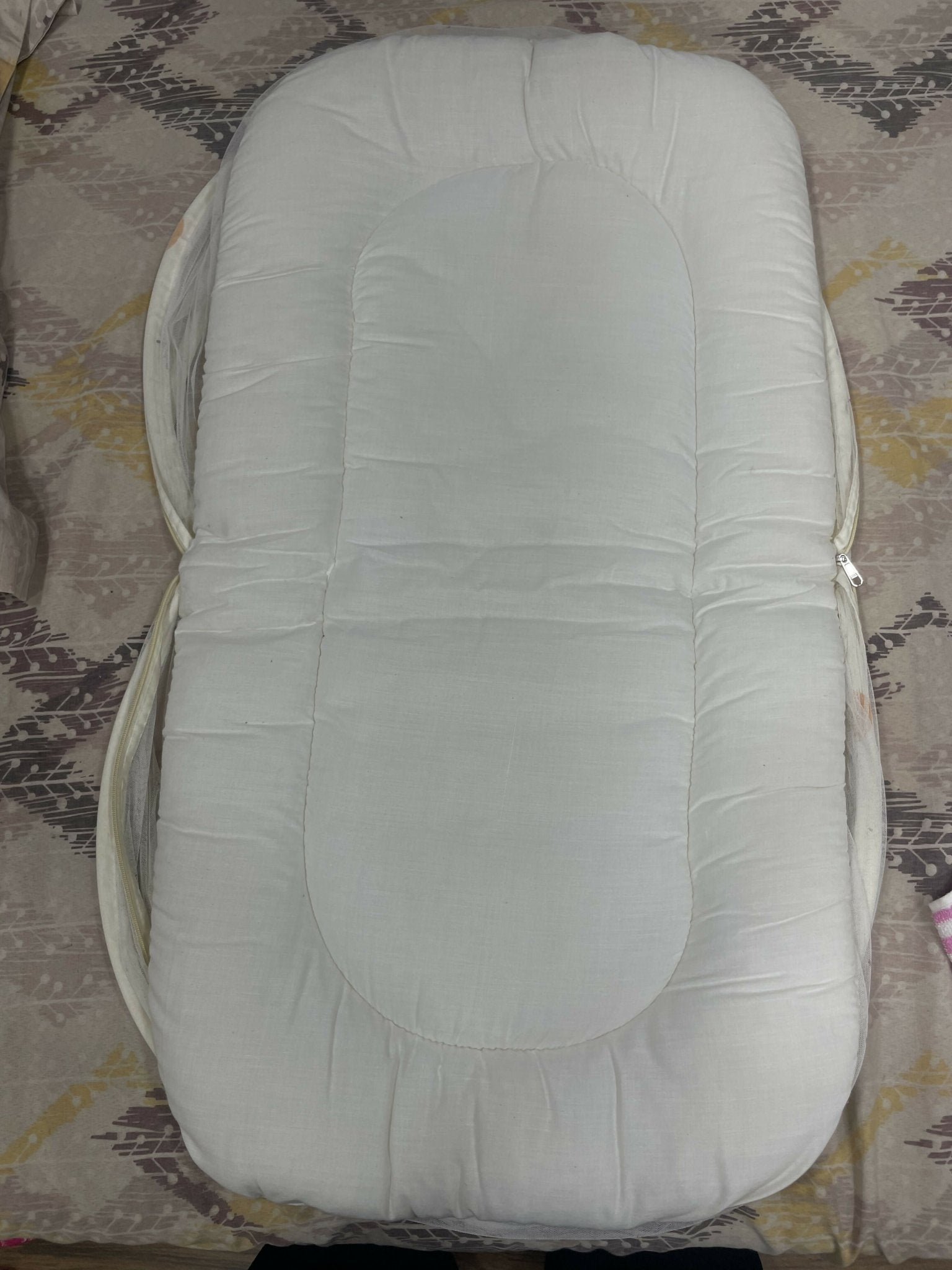 Baby bedding with mosquito net featuring a soft mattress, pillow, breathable fabric, and protective mosquito net for a cozy, comfortable, and secure sleeping space for babies.