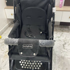 Evenflo travel system with baby stroller and infant car seat, featuring a foldable design, reclining seat, adjustable canopy, 5-point safety harness, and spacious storage basket for convenient travel.