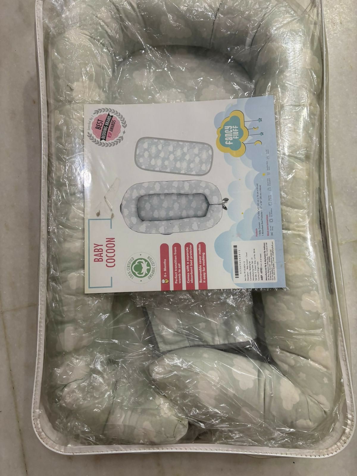 Mothercare Baby Cocoon with soft cushioned fabric, snug wrap design, and cozy support to keep newborns comfortable during sleep, rest, and travel.