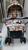 BABYHUG stroller with a lightweight foldable design, reclining seat, adjustable canopy, 5-point safety harness, smooth wheels, and spacious storage basket for comfortable travel with babies and toddlers.